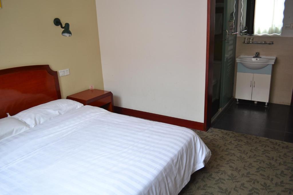 Jingyue 99 Inn Shanghai Pudong Airport Shiwan Branch Værelse billede